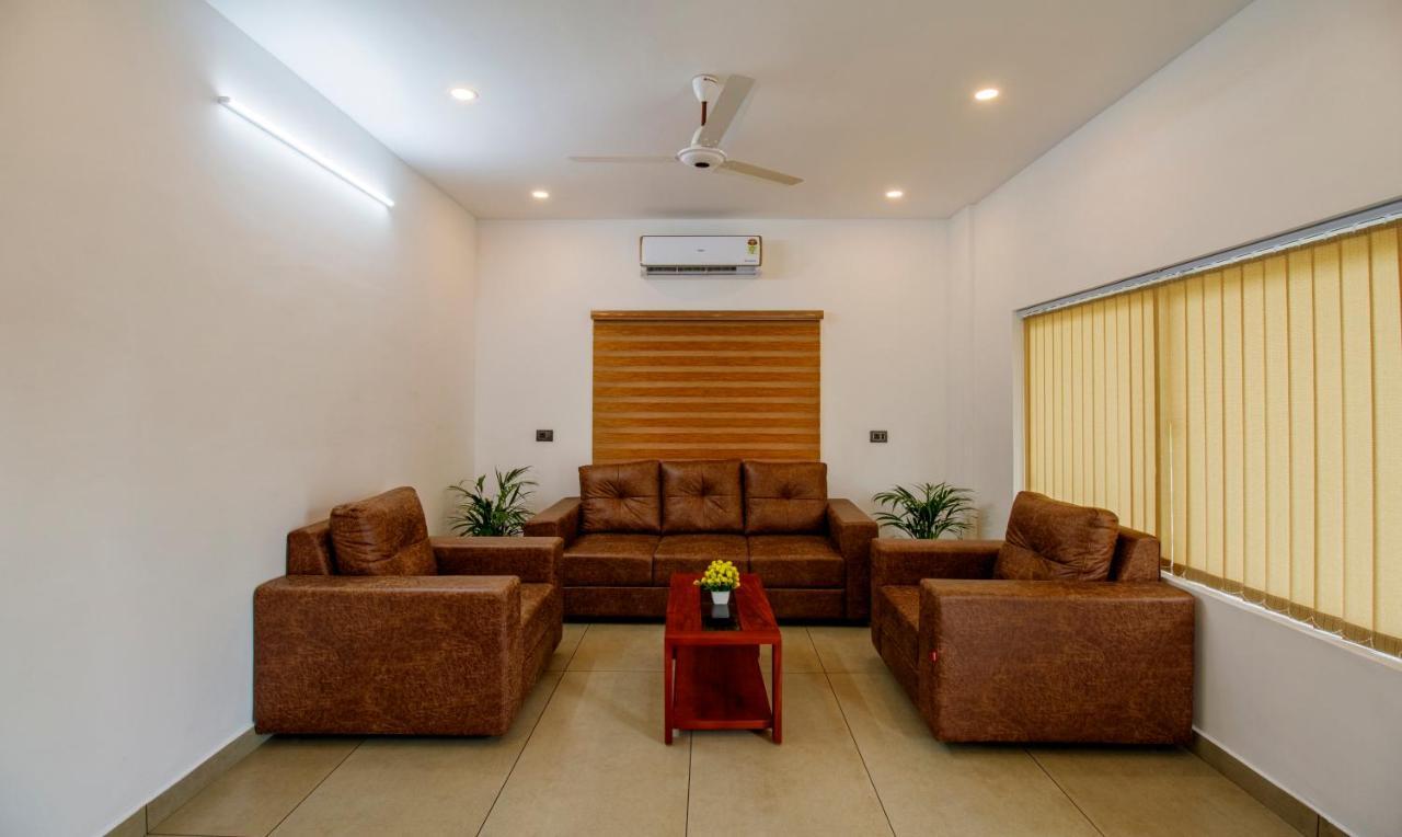 Treebo Amigos Residency Cochin Airport Hotel Kochi Eksteriør bilde